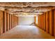 Unfinished basement awaiting customization, with exposed beams and a small window at 3448 Craggy Perch, Douglasville, GA 30135