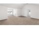 Bright bedroom features vaulted ceilings, plush neutral carpet and abundant natural light at 3448 Craggy Perch, Douglasville, GA 30135