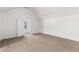 Spacious bedroom featuring neutral carpet, light walls, and a door leading to a connecting room at 3448 Craggy Perch, Douglasville, GA 30135