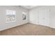 Bedroom featuring two windows and neutral paint at 3448 Craggy Perch, Douglasville, GA 30135
