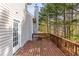 Cozy wooden deck with scenic view, perfect for outdoor relaxation and privacy from wooded surrounding area at 3448 Craggy Perch, Douglasville, GA 30135