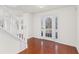 Welcoming entryway with hardwood floors and a bright glass door at 3448 Craggy Perch, Douglasville, GA 30135