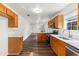 Bright open kitchen featuring stainless steel appliances, oak cabinets, and modern counters at 3448 Craggy Perch, Douglasville, GA 30135