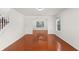 Spacious living room features gleaming hardwood floors and plenty of natural light at 3448 Craggy Perch, Douglasville, GA 30135