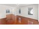 Spacious living room features gleaming hardwood floors and plenty of natural light at 3448 Craggy Perch, Douglasville, GA 30135
