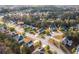 Residential area showcasing well-manicured lawns, tree-lined streets, and homes with ample parking at 3448 Craggy Perch, Douglasville, GA 30135