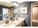 Modern bathroom features double sinks, ample counter space, and a separate tub and shower at 4720 Montane St, Cumming, GA 30028