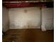 Unfinished basement showing concrete walls, open ceiling, and evidence of moisture at 5317 Kings Hwy, Douglasville, GA 30135