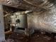 Basement area showing a vintage furnace unit wrapped in insulation at 5317 Kings Hwy, Douglasville, GA 30135