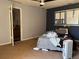 This bedroom has neutral walls, a window with AC, and potential for personalization with existing wall colors at 5317 Kings Hwy, Douglasville, GA 30135