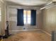 Bedroom features a window and neutral walls at 5317 Kings Hwy, Douglasville, GA 30135