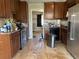 Kitchen with wooden cabinets and stainless steel appliances at 5317 Kings Hwy, Douglasville, GA 30135