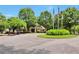 Beautiful clubhouse entrance, perfect for welcoming guests to this well-maintained community and its lush, landscaped surroundings at 5613 Lancashire Ln, Cumming, GA 30041