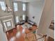 Bright living room with hardwood floors, large windows, and elegant decor at 5613 Lancashire Ln, Cumming, GA 30041