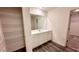 Bathroom with a mirror, vanity, and shelves at 60 Sonoma Drive, Dallas, GA 30157