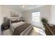 Cozy bedroom features a comfortable bed, modern decor, and a bright window at 60 Sonoma Drive, Dallas, GA 30157