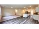 Spacious living room with carpet and wood flooring leading to kitchen at 60 Sonoma Drive, Dallas, GA 30157
