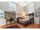 Inviting bedroom featuring bright windows, hardwood floors, and unique decor at 1031 State Nw St # 106, Atlanta, GA 30318