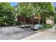 Well kept exterior view of the property, and ample parking for residents and guests at 1031 State Nw St # 106, Atlanta, GA 30318