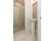 Contemporary bathroom with a glass-enclosed shower and a modern pedestal sink, offering a clean and functional design at 1145 Kirkwood Se Ave # 14, Atlanta, GA 30316