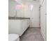Bathroom featuring a shower and double sink vanity with white cabinets at 1145 Kirkwood Se Ave # 14, Atlanta, GA 30316