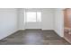 Bright bedroom with wood floors and an attached bathroom with tiled shower at 1145 Kirkwood Se Ave # 14, Atlanta, GA 30316