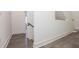 Hallway features hardwood floors, white walls, and white trim at 1145 Kirkwood Se Ave # 14, Atlanta, GA 30316