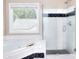 Bathroom featuring a soaking tub and a walk-in shower at 2995 Belshire Trl, Dacula, GA 30019