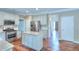 Modern kitchen with stainless steel appliances, granite counters, and a center island at 2995 Belshire Trl, Dacula, GA 30019