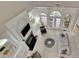 Bright living room with fireplace, built-ins, and access to outdoor living space at 415 Winn Park Ct, Roswell, GA 30075