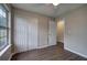 The bedroom features new wood flooring and a double-door closet at 4975 Rockstone Way, Acworth, GA 30101