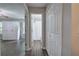 Hallway with wood floors leading to bathroom and bedroom at 4975 Rockstone Way, Acworth, GA 30101