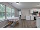 Eat-in kitchen offers a dining area, modern appliances, and ample counter space at 4975 Rockstone Way, Acworth, GA 30101