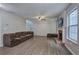 Spacious living room with hardwood floors, fireplace, and plenty of seating at 4975 Rockstone Way, Acworth, GA 30101