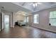 Large main bedroom with modern ceiling fan, neutral paint, and plenty of natural light from the many windows at 4975 Rockstone Way, Acworth, GA 30101