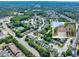 Aerial shot of neighborhood with inset of home, showcasing location and curb appeal at 1186 Hawthorn Ln, Grayson, GA 30017
