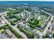 Expansive aerial view of a suburban neighborhood showcasing lush greenery and well-maintained homes at 1186 Hawthorn Ln, Grayson, GA 30017