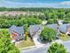 Residential street view of the home showing mature trees and neighborhood location at 1186 Hawthorn Ln, Grayson, GA 30017