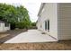 Backyard and patio area featuring a new shed and garden beds at 1186 Hawthorn Ln, Grayson, GA 30017
