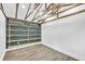 Interior space with wood-look floors, blue wall, and built in shelving at 1186 Hawthorn Ln, Grayson, GA 30017