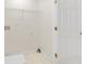A basic laundry room with minimal finishes including a wire rack and white walls at 1186 Hawthorn Ln, Grayson, GA 30017