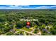 Aerial view of a beautiful home at 125 Legacy Way, surrounded by lush greenery at 125 Legacy Way, Oxford, GA 30054