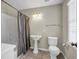 Bathroom with pedestal sink and shower at 125 Legacy Way, Oxford, GA 30054