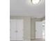 Bedroom featuring neutral walls, carpet, and a double door closet at 125 Legacy Way, Oxford, GA 30054