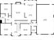Floorplan of the main level detailing the layout of living room, kitchen, dining area and garage at 125 Legacy Way, Oxford, GA 30054