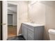 Neutral bathroom features a modern sink, vanity, and lighting at 273 Apalachee Church Rd, Auburn, GA 30011