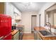 Modern kitchen featuring butcher block countertops, a retro refrigerator, and updated appliances at 273 Apalachee Church Rd, Auburn, GA 30011