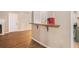 Cozy kitchenette featuring a breakfast bar, a sink, and an retro-style refrigerator at 273 Apalachee Church Rd, Auburn, GA 30011