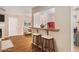 Cozy living room with bar seating and dining area beyond at 273 Apalachee Church Rd, Auburn, GA 30011