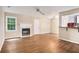 Inviting living space with a fireplace, an open floor plan, and a breakfast bar at 273 Apalachee Church Rd, Auburn, GA 30011